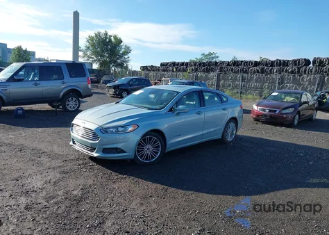2013 Ford Fusion Hybrid Se z USA, uszkodzony, nr VIN 3FA6P0LUXDR187683